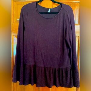 Peplum wine colored sweater.